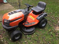 Hursqvarna LT154 ride on mower with grass collectors. (2014). Location: Huntingdon, Cambridgeshire.