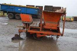 Standon 2 Row Bulb Planter with fertilizer boxes stored under cover Location: Martham, Norfolk