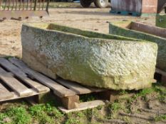 Large hewn stone trough