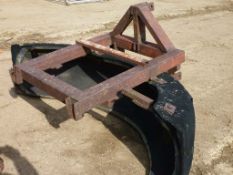 Rear mounted yard scraper