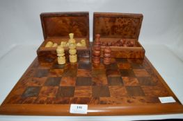 Walnut and Mahogany Chess Board with Two Walnut Boxes Containing Chess Pieces