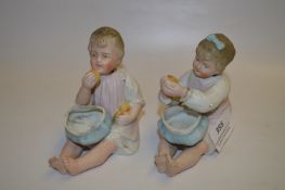 Pair of Bisque Nodding Head Figures