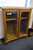 Oak Glazed Display Cabinet on Cabriole Legs