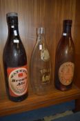Three Large Beer Bottles