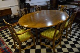 Large Solid Oak Oval Topped Gate Leg Dining Table with Four Plus Two Oak Dining Chairs