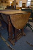 Small Oak Oval Topped Gate Leg Table