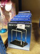 Nine Boxed Newton's Cradles