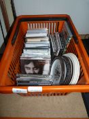 Basket Containing CDs and Commemorative Plates