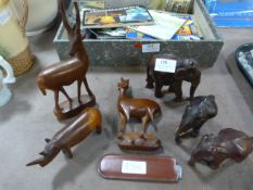 Carved Wooden Elephants and Antelope