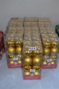 *Thirteen Boxes of Shatterproof Gold Baubles