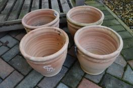 *Four Small Terracotta Planters