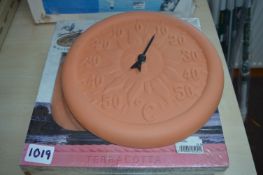 *Four Terracotta Thermometers