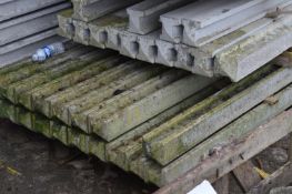 *Eighteen 9' Slotted Concrete Posts