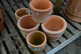 *Seven Small Terracotta Pots
