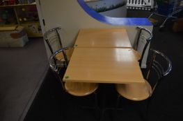 *Two 60x70 Cafe Style Tables with Simulated Beech Tops on Pedestal Bases with Four Matching Chrome