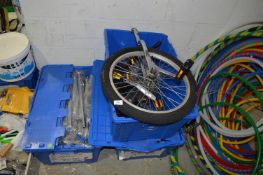*Three Boxes Containing Unicycle Spare Parts