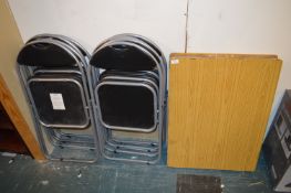 *Eight Folding Chairs and a Folding Table