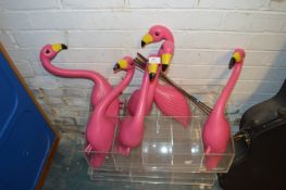 *Six Pink Flamingos