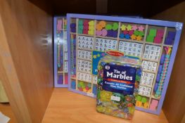 *Four Melissa & Doug Wood Games and a Tin of Marbles