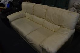 Cream Leatherette Three Seat Settee