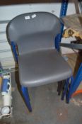 4 Grey Stacking Chairs