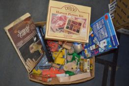 Box Containing Toys and a Harvest Picture Kit