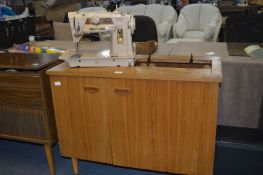 Singer Sewing Machine in Teak Cabinet