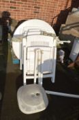 White Plastic Garden Table and Four Folding Chairs
