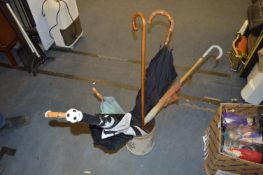 Five Umbrellas and a Walking Stick