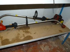 Two Petrol Driven Strimmers