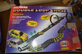 Artin Double Loop Chase Car Racing Game