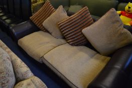 Brown Leather Cushioned Sofa