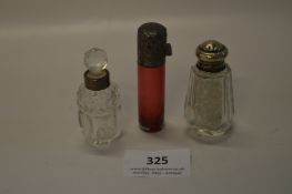 Two Silver Topped Scent Bottles and One Cranberry Glass Silver Topped Scent Bottle