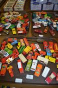 Three Trays Containing Approximately 100 Play Worn Diecast Matchbox and Other Vehicles