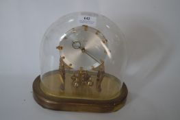 Domed Glass Cased Kundo Clock