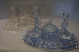 Two Glass Dressing Table Sets (One Blue, One Clear)