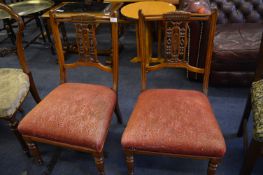 Pair of Walnut Carved Back Low Chairs