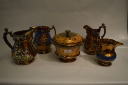 Four Copper Lustre Pottery Jugs and a Lidded Bowl