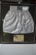Framed and Signed Boxing Shorts Ken Norton and Larry Holmes