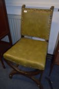 Pair of Green Upholstered Dining Chairs with Brass Studded Seats and Back