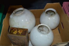 Three White Glass Ceiling Globes