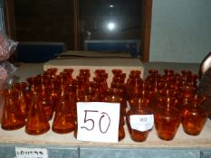 *Fifty Amber Glass Vases
