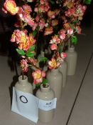 *Ten Vases with Apple Blossoms