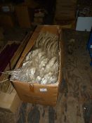 *Box Containing Bleached Contorted Sticks with Seed Pods