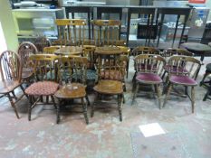 Eighteen Assorted Darkwood Pub Chairs Including Wheel Backs, Spindle Backs and Captain Chairs