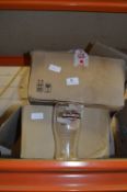 Two Boxes of Branded Glasses