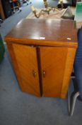 Singer Sewing Machine in an Oak Cabinet