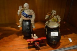 Three Cast Iron Michelin Man Figures