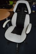 *Black and White Upholstered Heated Swivel Armchair