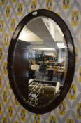 Oval Framed Bevelled Edge Wall Mirror